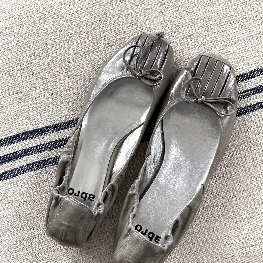 Grey/silver flats.  Worn once.  Excellent condition.  Very cute flats!